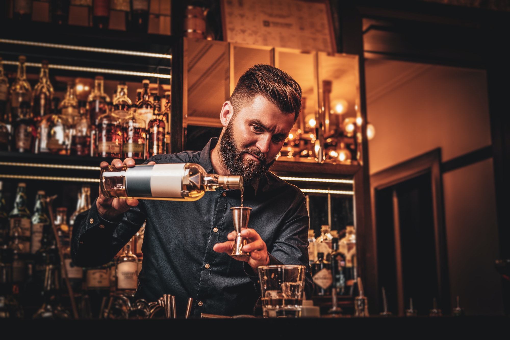bar-manager-is-making-drinks-at-the-bar.jpg bar-manager-is-making-drinks-at-the-bar.jpg